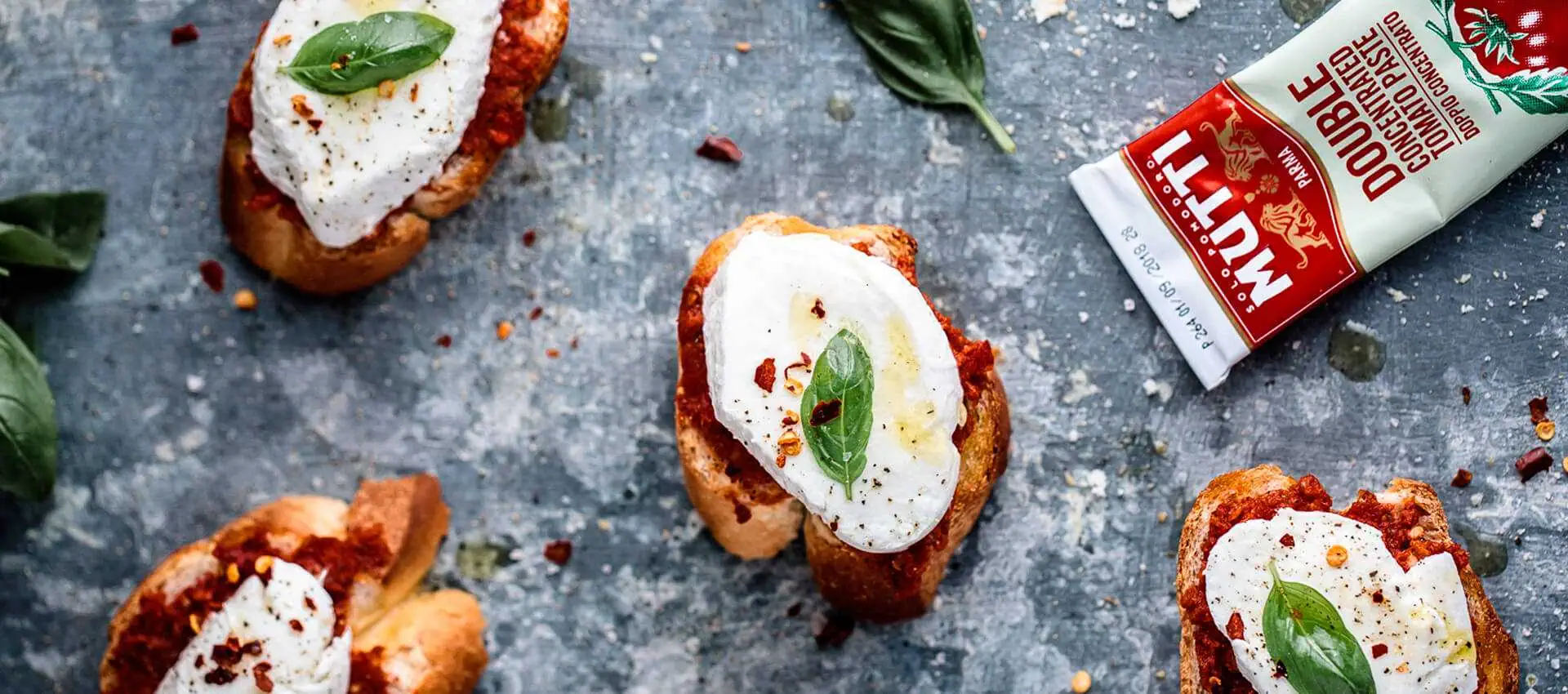 Tomato bruschetta with anchovy and mozzarella