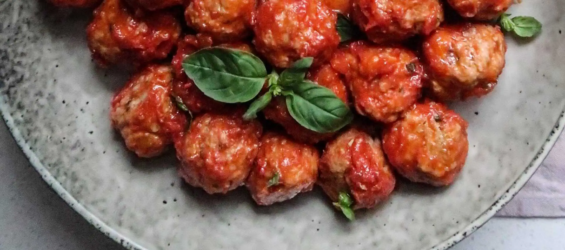 Italian meatballs with sieved tomatoes