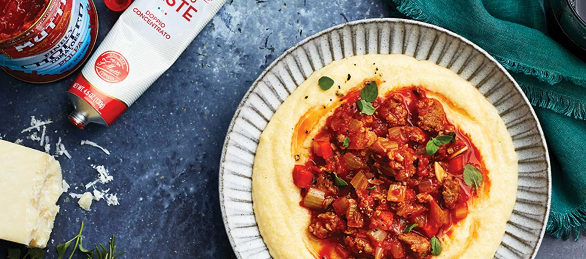 Spicy polenta with sausage ragu